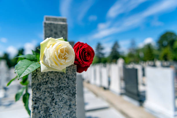 Flowers left on a grave at Colonial Park Cemetery in Savannah, Georgia.