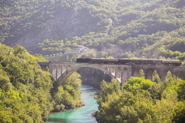 Old steam train on world's longest stone bridge Old steam train on world's longest stone bridge near Solkan - Nova Gorica, Slovenia nova gorica stock pictures, royalty-free photos & images