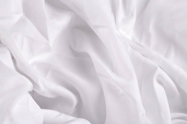istock white silk or satin luxury cloth texture background, Smooth elegant fabric bed sheet texture 1157372824