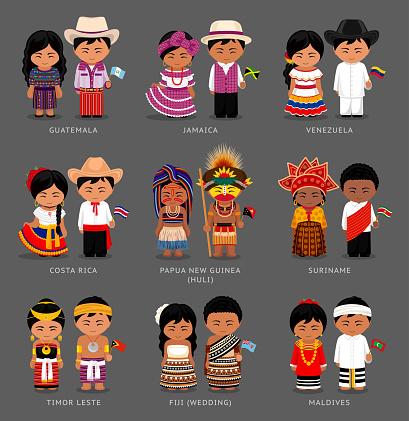 People in national dress. South America. Timor Leste, Fiji, Maldives, Papua New Guinea, Huli tribe. Set of pairs dressed in traditional costume with flag.