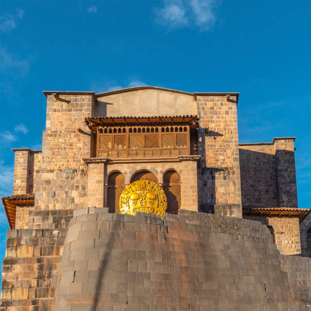 Inca Sun Temple, Cusco, Peru Square photo of the inca sun temple or Qorikancha in Cusco city during Inti Raymi, hence the solar disk. Famous for its Inca stonework and Santo Domingo convent built on top, Cusco, Peru. inti raymi stock pictures, royalty-free photos & images