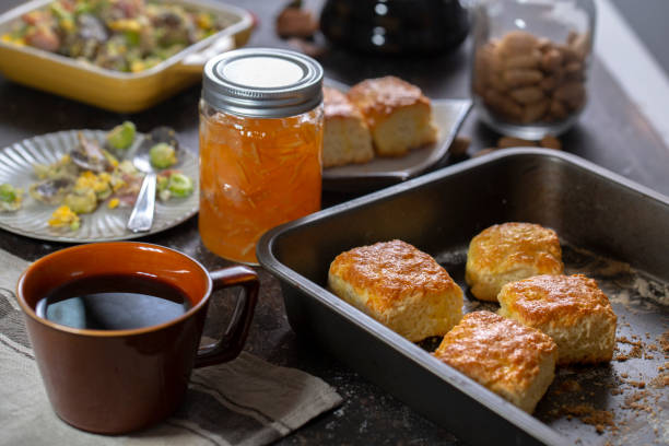 Healthy breakfast: homemade scone, coffee and vegetable salad