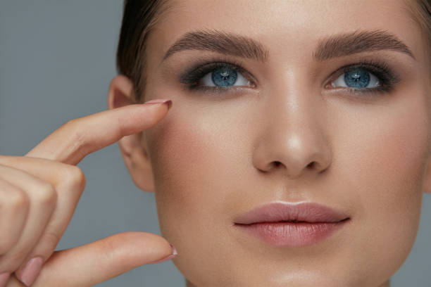istock Beauty face makeup. Woman with beautiful eyes and eyebrows 1157385965