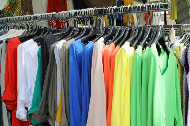istock many colorful clothes in a shop 1157386325