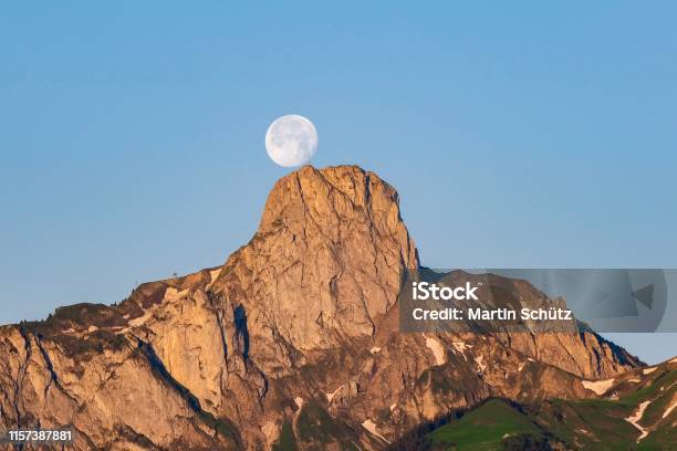 The Full Moon Dances Over The Stockhorn Stock Photo - Download Image Now