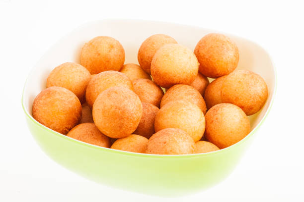 istock Traditional Colombian buuelo - Deep Fried Cheese Bread on white background 1157389751