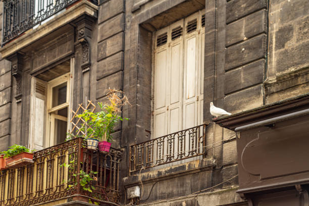 istock Bordeaux upstairs window close-up 1157398143