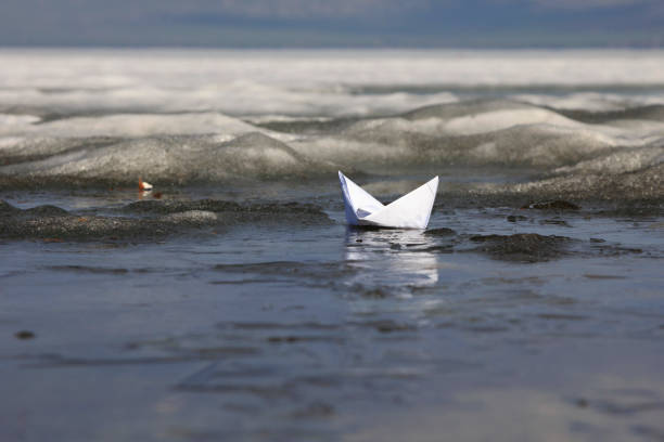 Paper boat in the ice