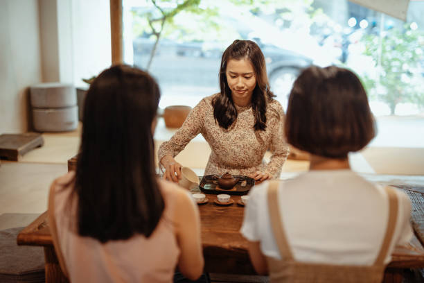 istock Tea time for group of Chinese friends 1157401019