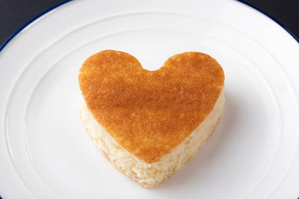 istock Heart shape confection on white plate 1157404309