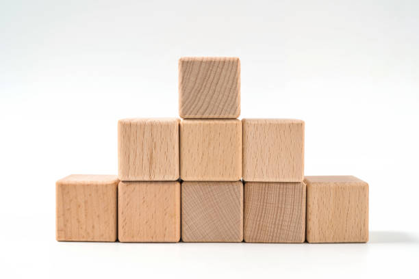 istock wood cube arrange in pyramid shape ,business concept 1157411236