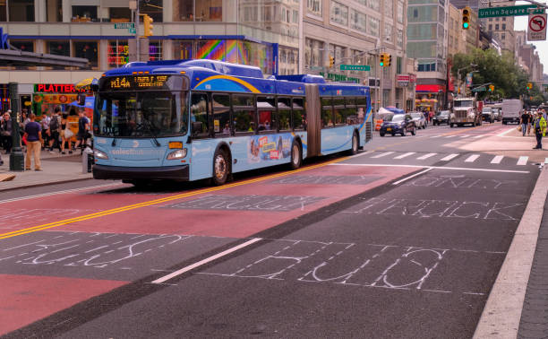 Manhattan, New York, USA - March, 2024.  Tour bus on a Manhattan street.