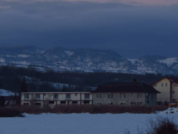 An abandoned house surrounded by mountains in Iceland