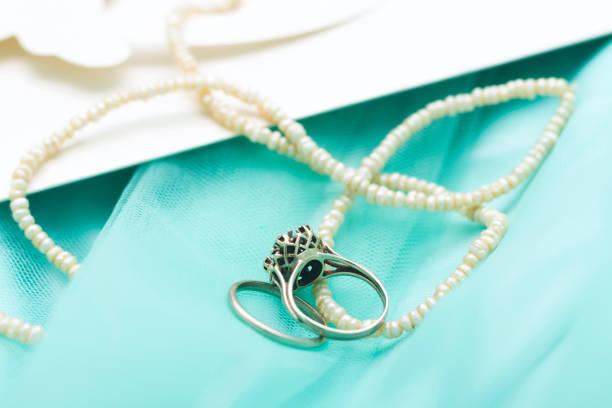 istock Wedding rings on the invitation card, preparations for the wedding, wedding decorations 1157421855