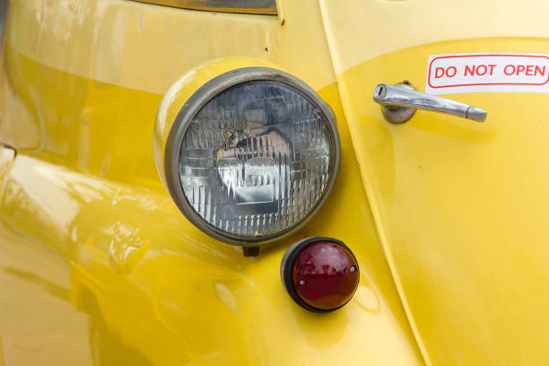 istock Lights in front of a vintage car 1157425980