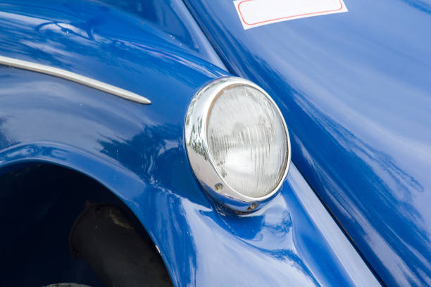 istock Lights in front of a vintage car 1157426025