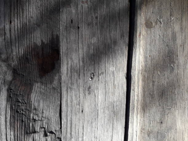 istock Light and Shodow on teak wood boards 1157427760