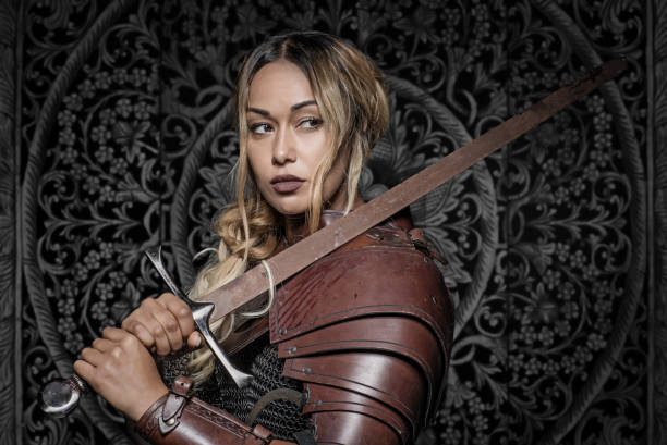 istock Beautiful black Sword wielding viking warrior female 1157428855