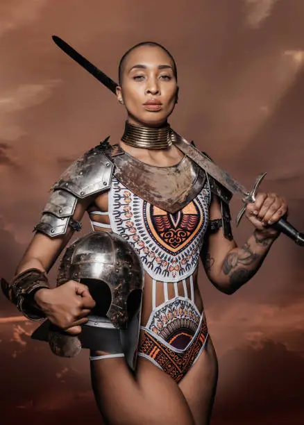 Photo of Beautiful mixed race Sword wielding viking warrior female
