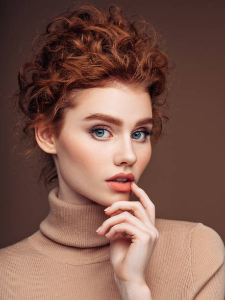 istock Beautiful woman with curly hairstyle 1157429035