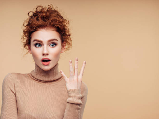 istock Beautiful woman with curly hairstyle 1157429332