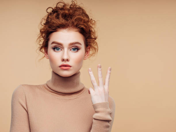 istock Beautiful woman with curly hairstyle 1157429940