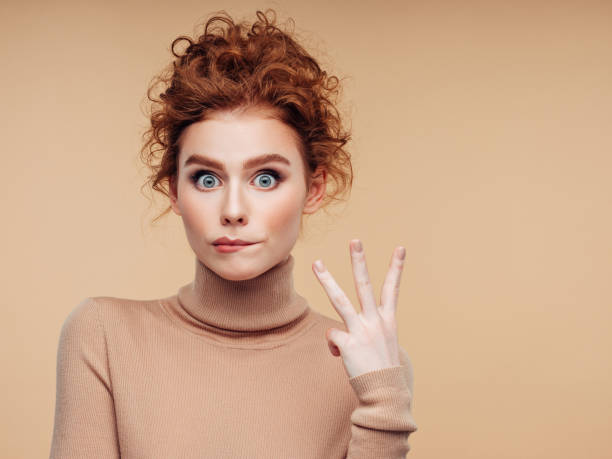 istock Beautiful woman with curly hairstyle 1157429970