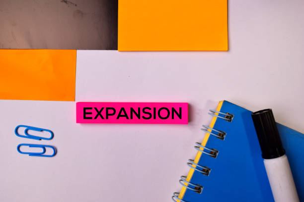 istock Expansion on sticky notes isolated on white background. 1157429993