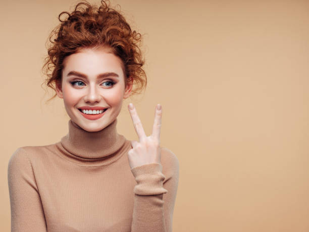 istock Beautiful woman with curly hairstyle 1157430140