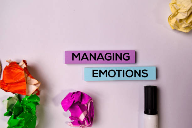 istock Managing Emotions on sticky notes isolated on white background. 1157430195