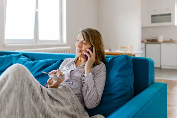 istock Mature Woman Making a Phone Call With Smartphone 1157431206