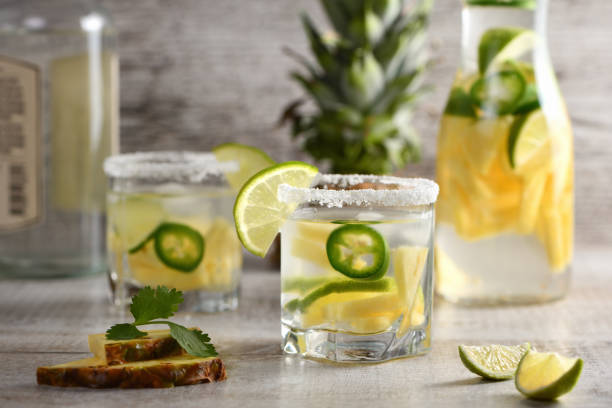 Spicy Margarita. Tequila Infused on Slices of Fresh Pineapple, Lime,  hot jalapeno