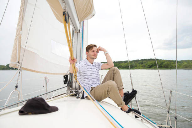 istock Handsome young man on yacht 1157435178