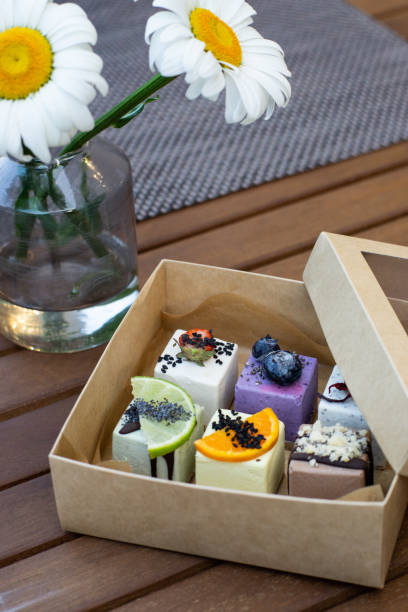 istock Raw vegan desserts in the box with fresh berries 1157435576