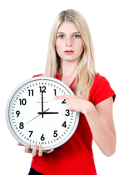 istock Young beautiful woman with the clock 115743649