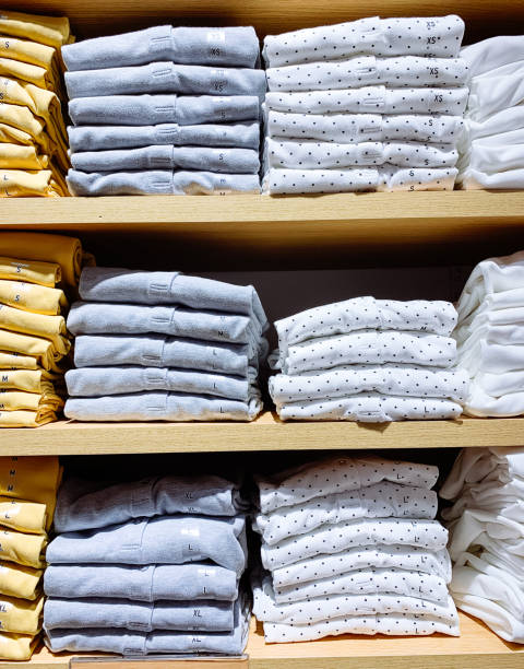 istock Stack of cotton T-shirt in shop 1157439924