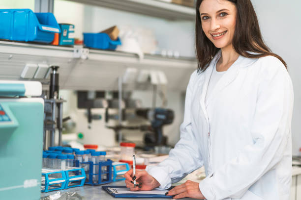 istock Smiling scientist loves her job 1157447783