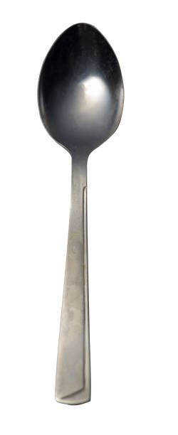 istock spoon isolated on white background. metal spoon. vintage spoon. 1157447839