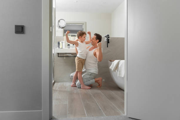 istock Father is spending time with his son at home 1157450994