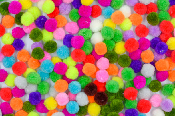 istock A colorful of Pom Pom background 1157489006