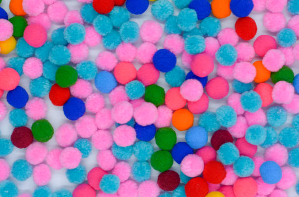 istock A colorful of Pom Pom background 1157489019
