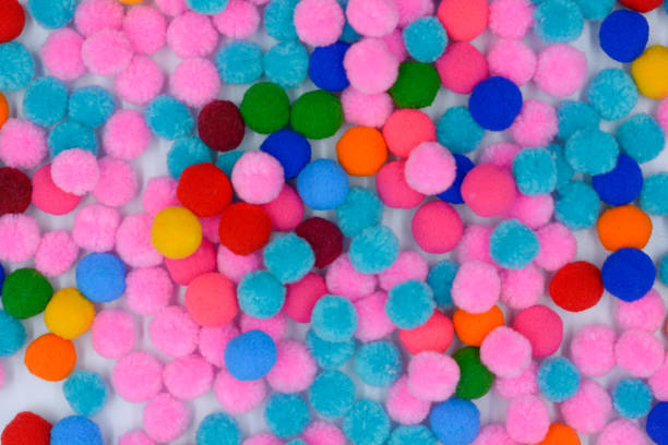 istock A colorful of Pom Pom background 1157489033