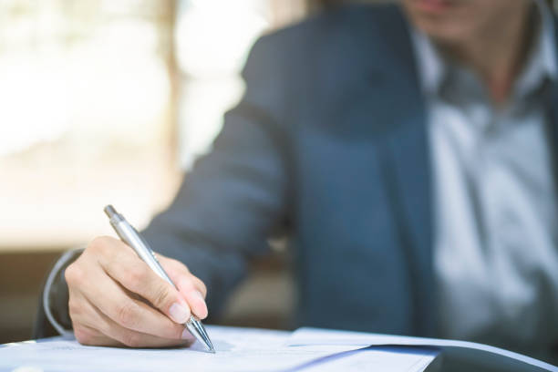 istock Close up of business man working at office. 1157491496