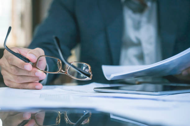 istock Close up of business man working at office. 1157492584