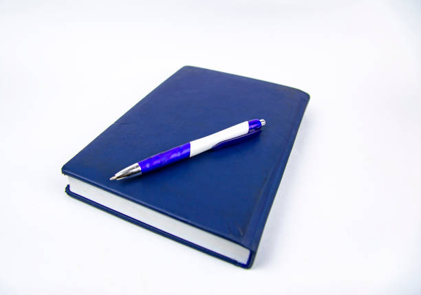 istock Closed weekly with pen on a white background. 1157494181