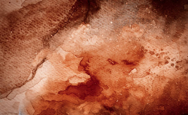 istock Brown abstract watercolor background with splashes 1157494533