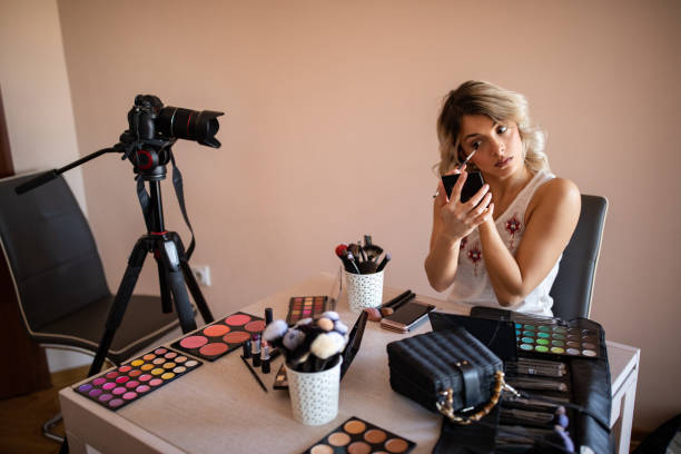 istock Beautiful young woman vlogging about cosmetics 1157495356