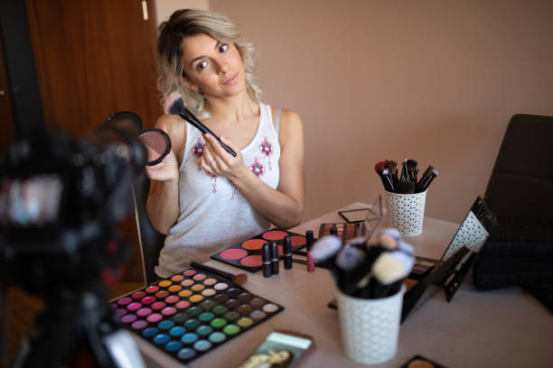 istock Beautiful young woman vlogging about cosmetics 1157497226