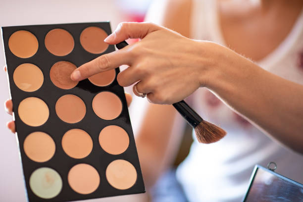 istock Beautiful young woman vlogging about cosmetics 1157497273