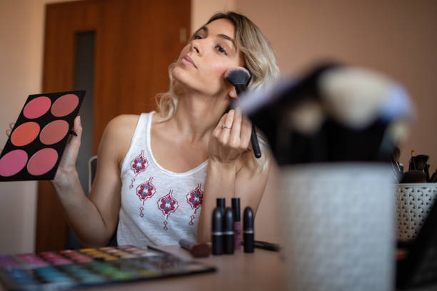 istock Beautiful young woman vlogging about cosmetics 1157497333